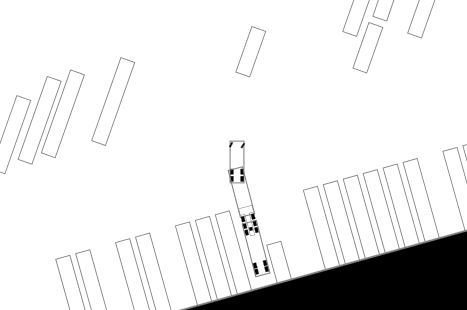 top view outline of a truck backing up to a dock at a package facility